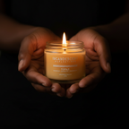 Hands giving — dark skin, candle lit