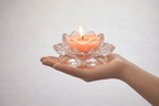 Sacral Chakra Candle in Hand